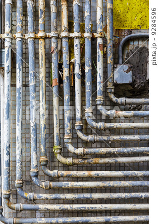 Many pipes on the wall 9284596