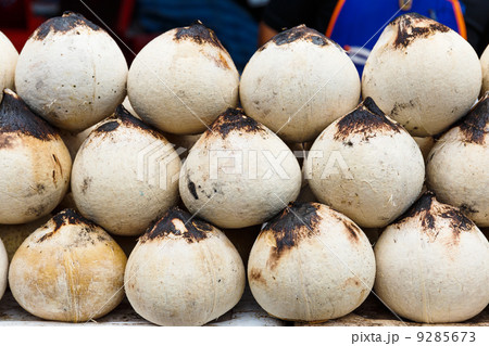 Young coconut drinks on street 9285673