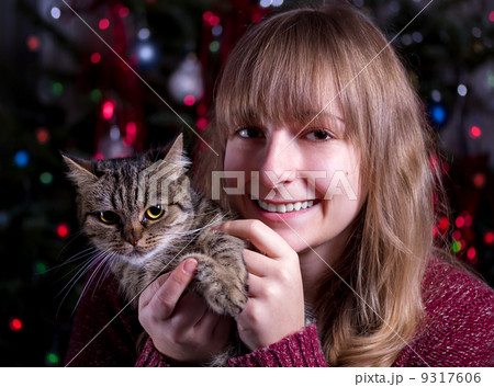Portrait of a girl with a cat Portrait of a girl with a cat 9317606