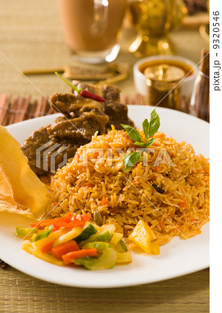 Biryani rice with traditional items on background 9320546