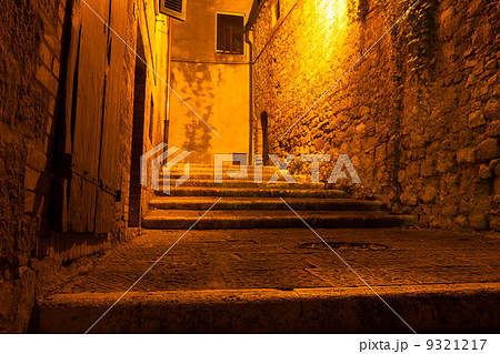 mysterious narrow alley with lanterns, Italy 9321217