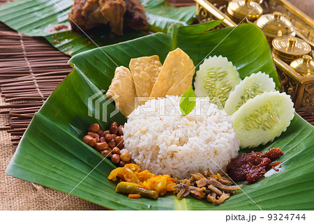 nasi lemak, a traditional malay curry paste rice dish served on 9324744