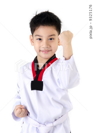 Taekwondo action by a asian cute boy Taekwondo action by a asian cute boy 9325176