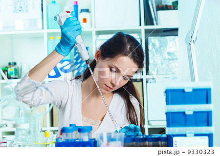 Woman in the microbiology laboratory Woman in the microbiology laboratory 9330323