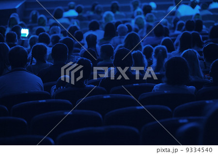Audience in the cinema. Silhouette. Audience in the cinema. Silhouette. 9334540