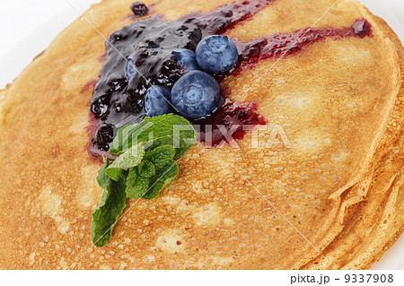 traditional homemade blinis or crepes with blueberries 9337908
