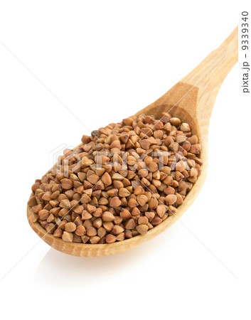 buckwheat in spoon on white buckwheat in spoon on white 9339340