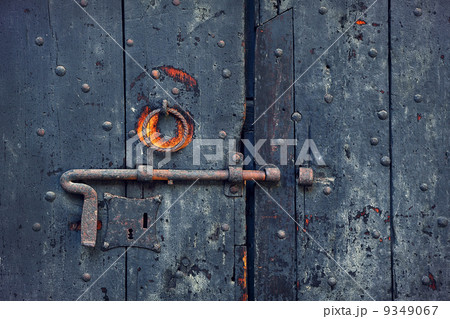 Rusty bolt on old wooden door. Rusty bolt on old wooden door. 9349067