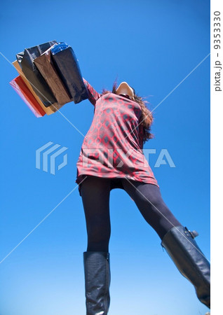 shopping woman dancing 9353330