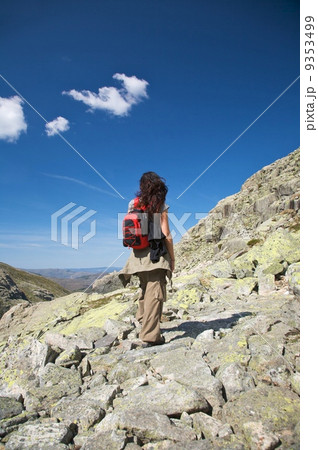 trekking woman and clouds trekking woman and clouds 9353499