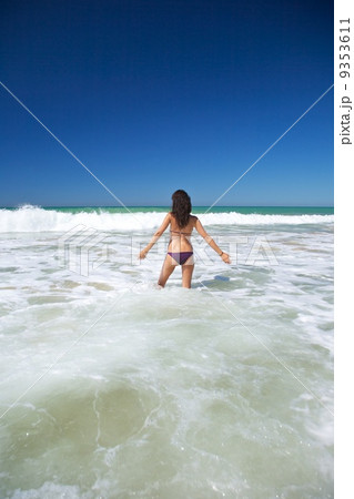 walking in water at Conil beach 9353611