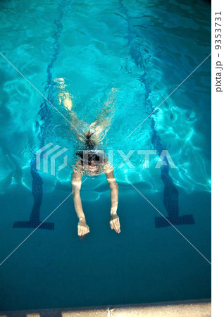 woman immerse in a pool woman immerse in a pool 9353731