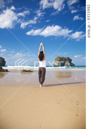 arms up woman in Ballota beach 9353992