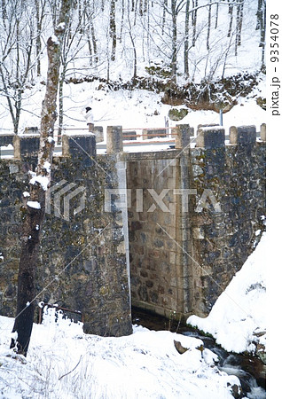woman on snow bridge 9354078
