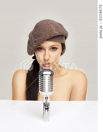 Sexy woman singing in retro mic Sexy woman singing in retro mic 9358676
