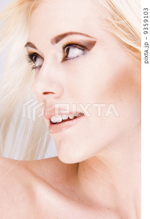 Close-up of beautiful face with long hair Close-up of beautiful face with long hair 9359103