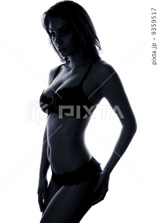 Beautiful female body in black lingerie isolated 9359517