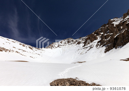 Snowy mountains and blue sky at nice winter day 9361076