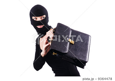 Industrial espionage concept with person in balaclava Industrial espionage concept with person in balaclava 9364478