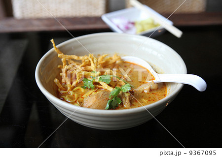 Noodle Khao soi , Thai food on wood background 9367095