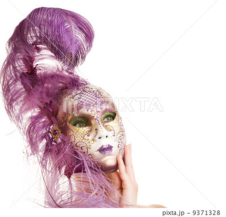 Beautiful young woman in carnival mask 9371328