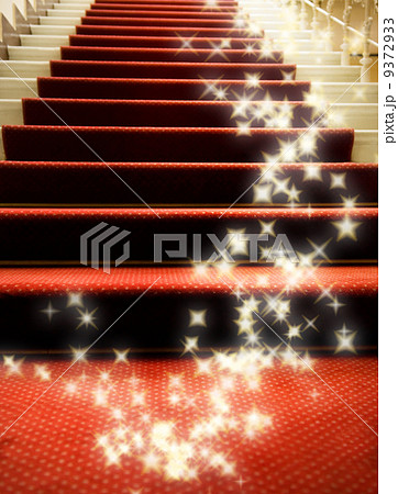 Stairs covered with red carpet 9372933