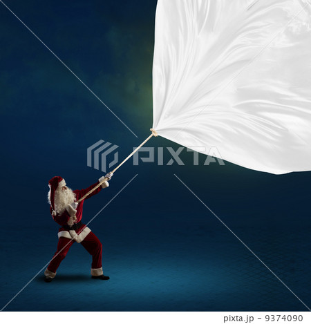 Santa Claus pulls the banner Santa Claus pulls the banner 9374090