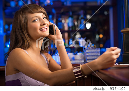 woman talking on the cellphone woman talking on the cellphone 9374102