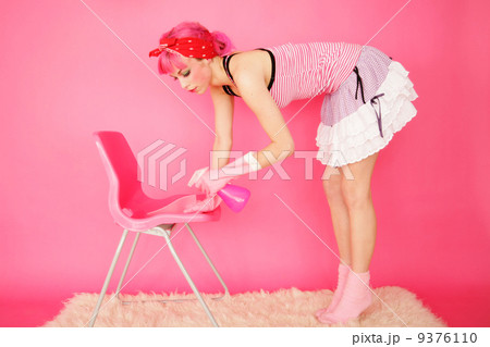 charwoman with pink hair working in pink room charwoman with pink hair working in pink room 9376110