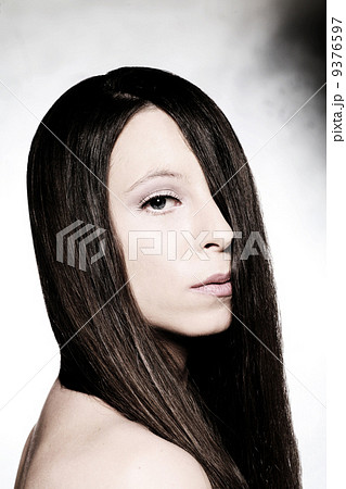 Woman with long hairs 9376597