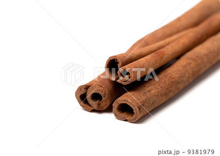 Cinnamon sticks on white background Cinnamon sticks on white background 9381979