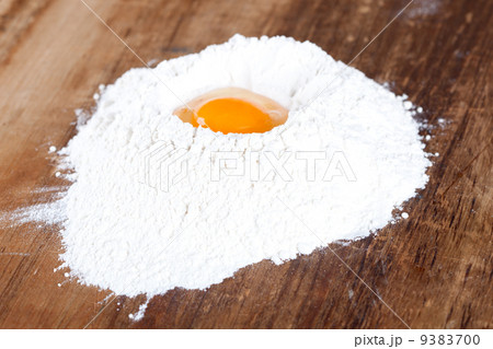 broken egg on flour 9383700