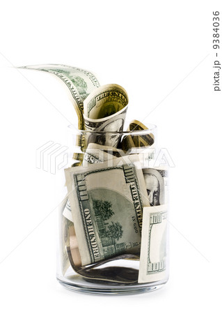 money in glass jar 9384036