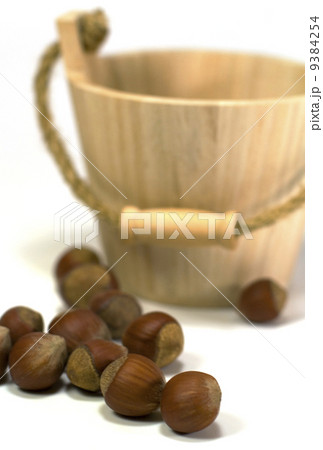 hazelnuts and wooden basket 9384254