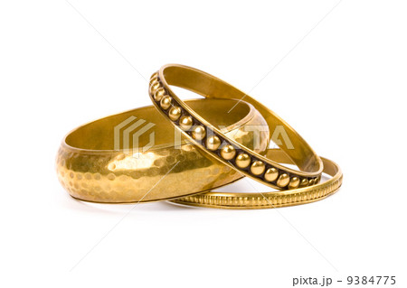 three golden bracelets 9384775
