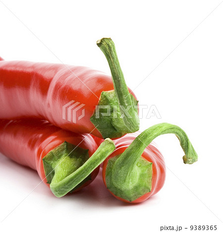 three red chili peppers 9389365