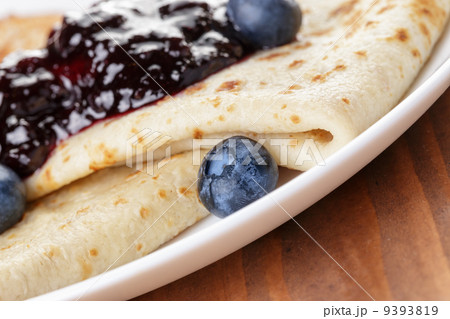 homemade blinis or crepes with blueberries and jam homemade blinis or crepes with blueberries and jam 9393819