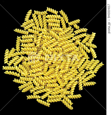 Macaroni on black background Macaroni on black background 9400407