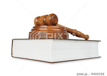 Wood gavel and soundblock on on a thick book Wood gavel and soundblock on on a thick book 9400588