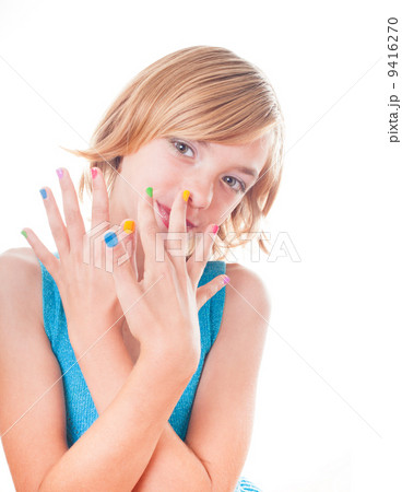 Girl with rainbow nails 9416270