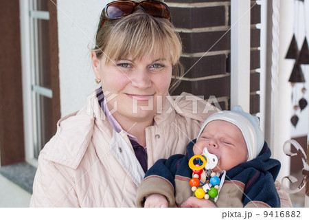 Young mother with little newborn baby Young mother with little newborn baby 9416882