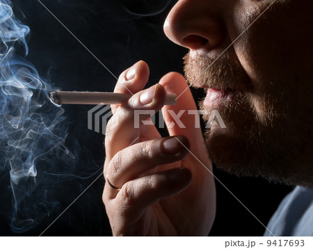 Portrait man smoking cigarette 9417693