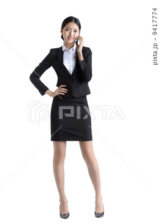 Business woman using mobile phone studio white background Business woman using mobile phone studio white background 9417774