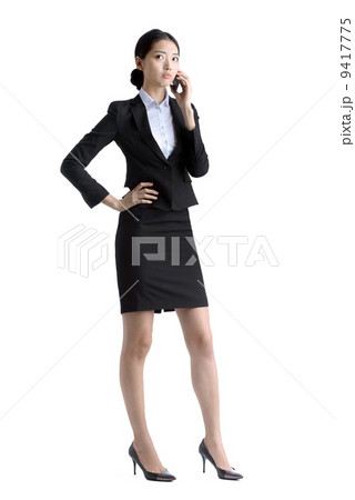 Business woman using mobile phone studio white background Business woman using mobile phone studio white background 9417775