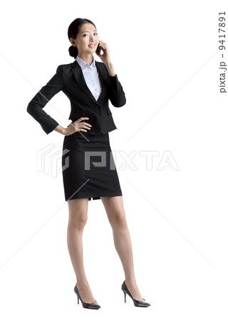 Business woman using mobile phone studio white background Business woman using mobile phone studio white background 9417891