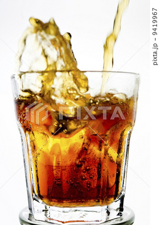 dramatic cola splash, there is some movement in the splashes dramatic cola splash, there is some movement in the splashes 9419967