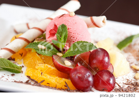 tasty dessert with ice cream and fruits 9421802