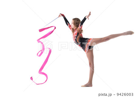 Harmonous artistic gymnast dancing in studio Harmonous artistic gymnast dancing in studio 9426003