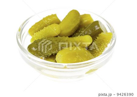 Pickled cucumber in glass bowl isolated on white background 9426390
