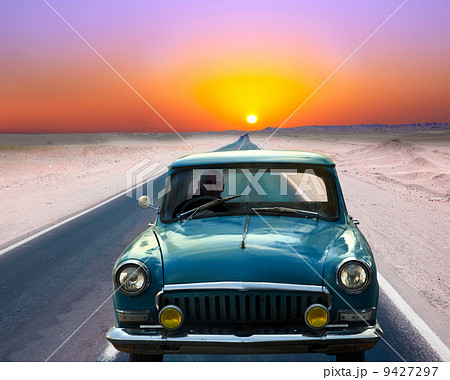 Man driving on retro car Man driving on retro car 9427297